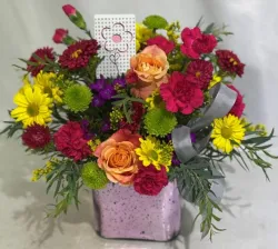 Celebrate Mom with flowers or a unique gift