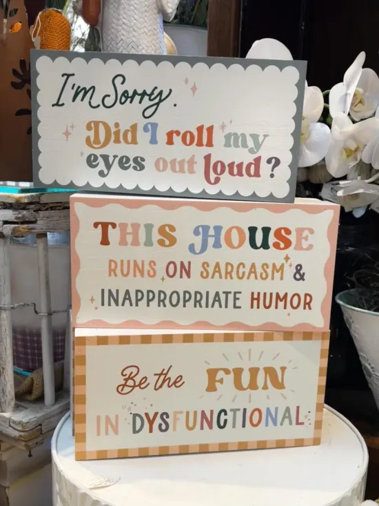 Signs and Shelf Sitters