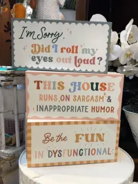 Signs and Shelf Sitters