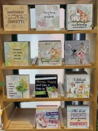 Signs and Shelf Sitters