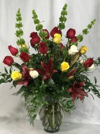 24 roses with lilies and bells