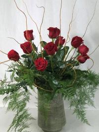 12 Roses in decorative container