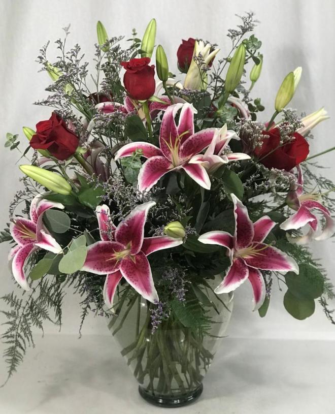 6 roses and 8 stargazer lilies